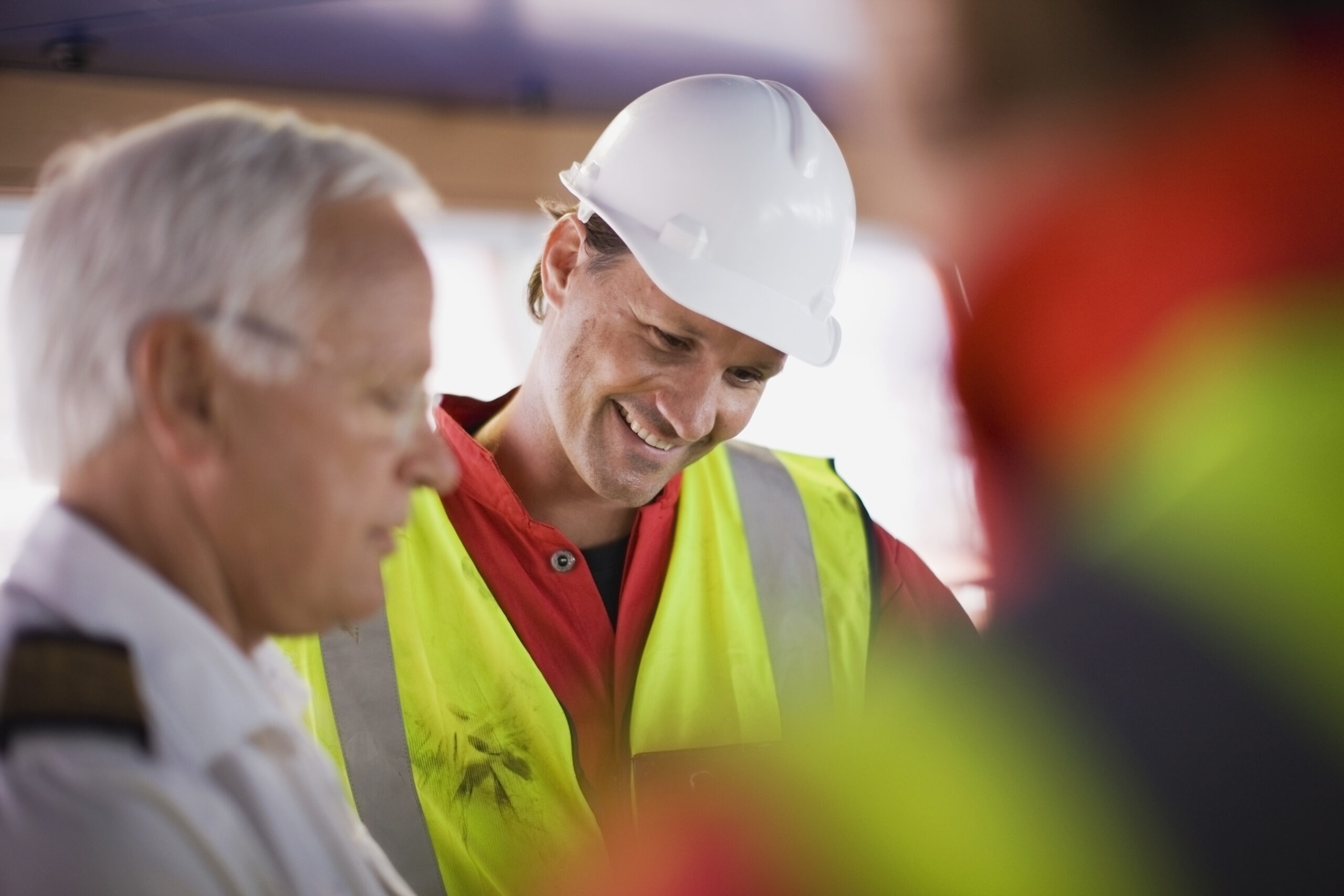Captain talking to workers
